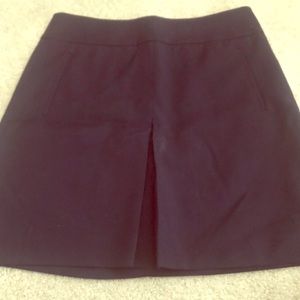 Navy pleated work skirt